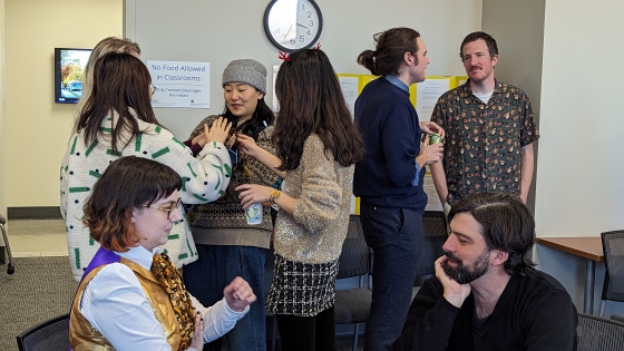 A group of philosophers chatting. 